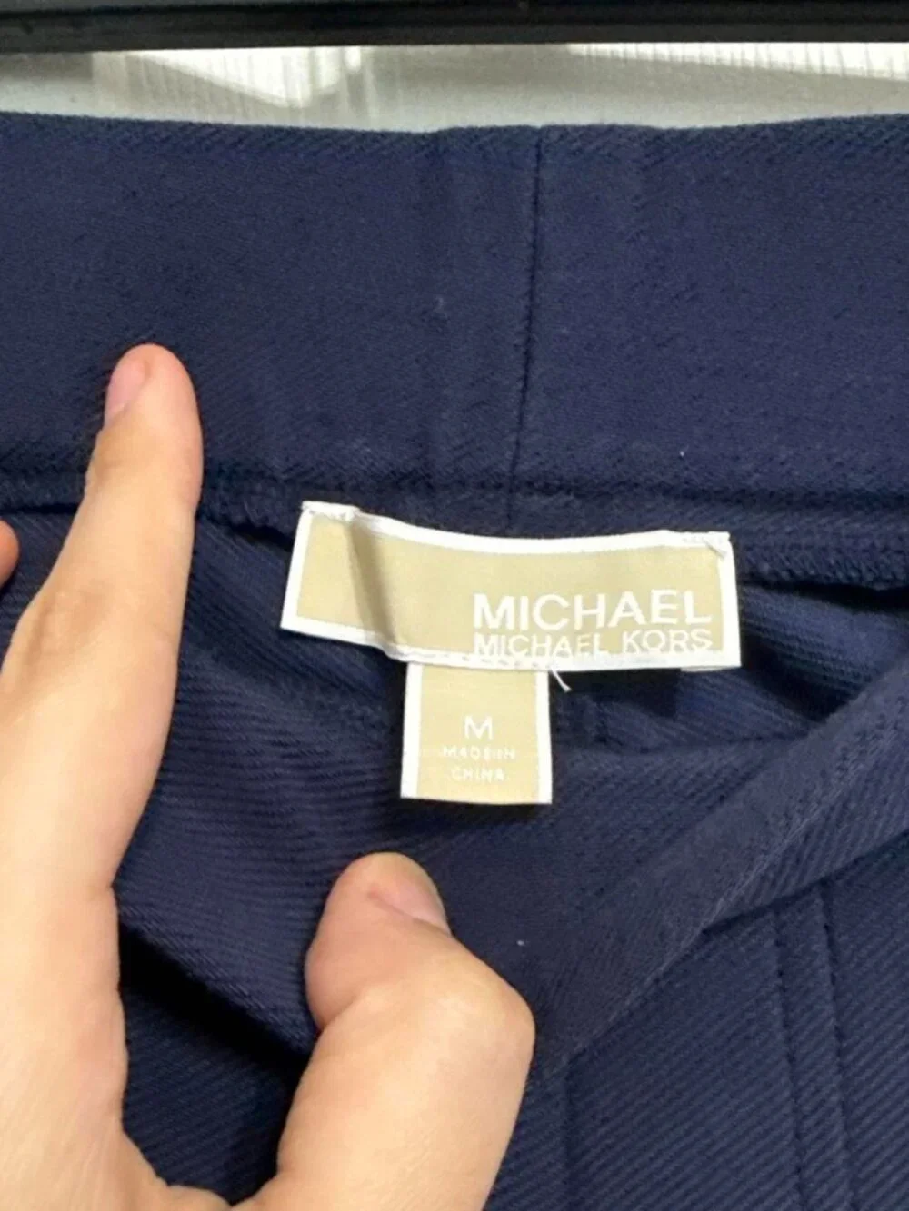 Navy blue elastic waistband business trousers with gold buttons